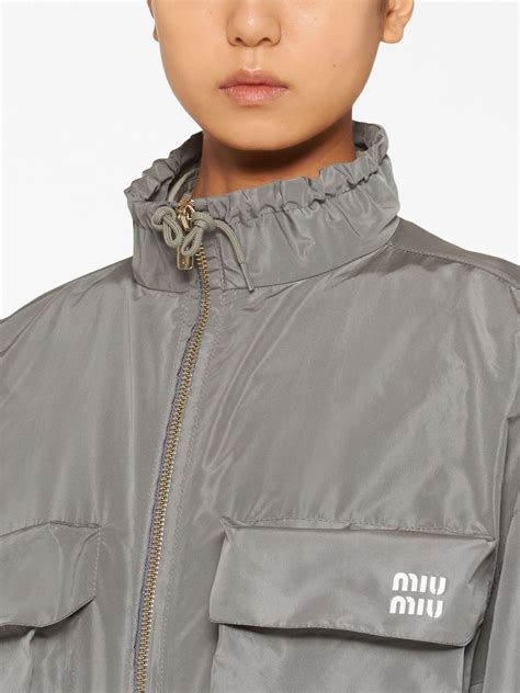 farfetch miumiu parka coats.